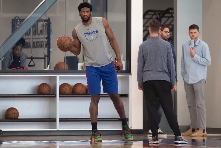 Sixers, Joel Embiid looks on during practice at the Philadelphia Sixers training complex in Camden, N.J. Wednesday, April 17, 2019.