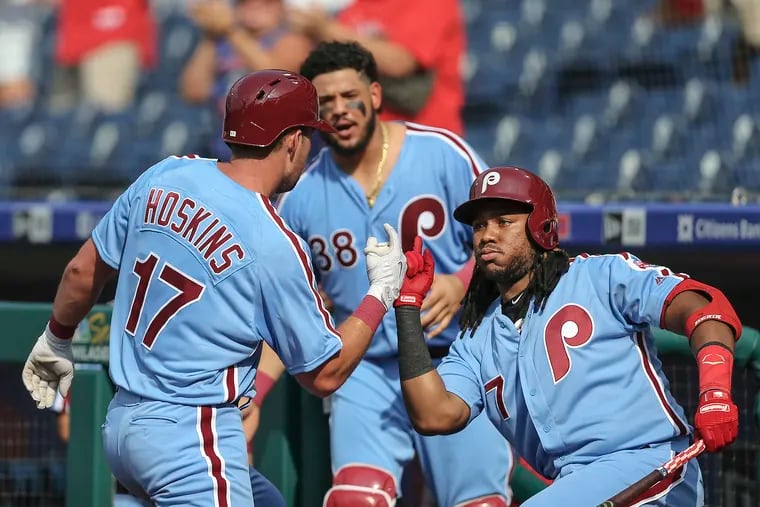 Rhys Hoskins, Jorge Alfaro and Maikel Franco (left to right) are part of a young Phillies core that is going through its first playoff race.