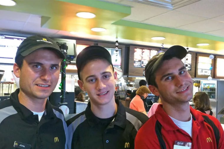 From left, John, Carl and Mark DiStefano, three of columnist Joseph N. DiStefano's sons, working at their local McDonald's in spring 2011.