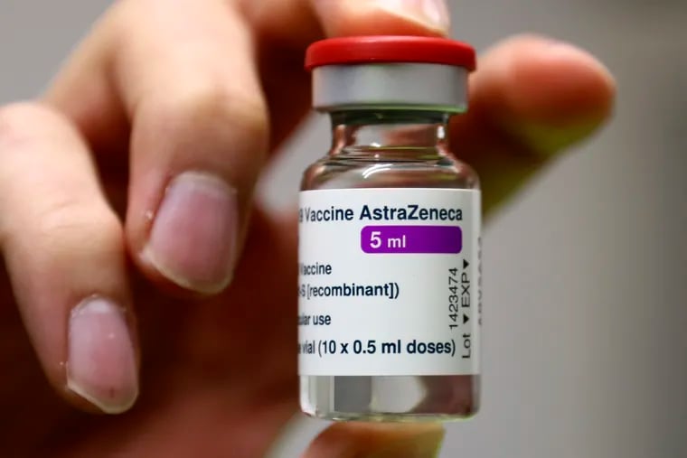 Medical staff prepares an AstraZeneca coronavirus vaccine at a vaccine center in Ebersberg near Munich, Germany, on Monday.