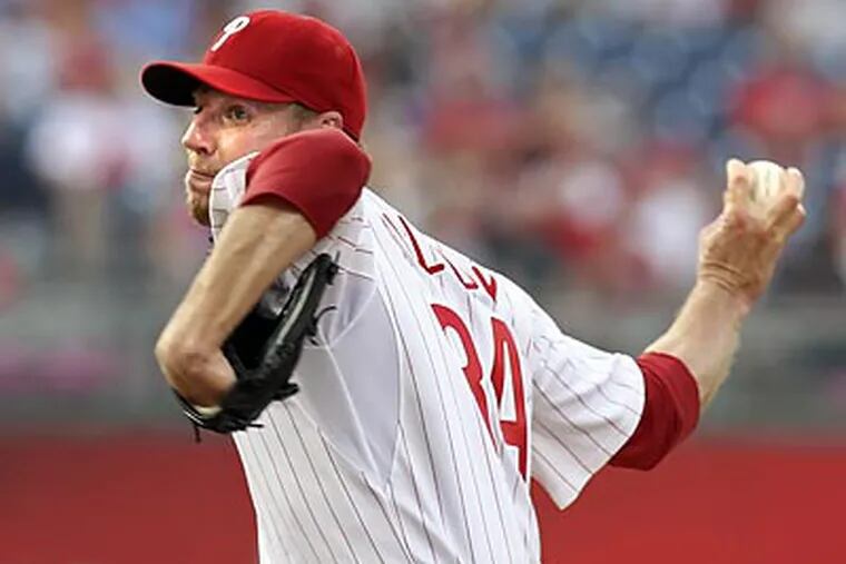 Roy Halladay pitched eight shutout innings to earn his 11th win of the season. (Steven M. Falk / Staff Photographer)