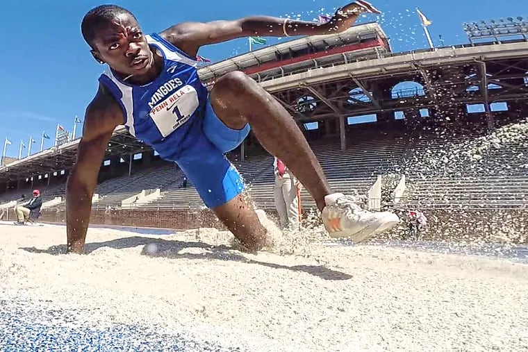 Bahamas.Ken Mullings, lands in the sand during the long jump competitions in the Penn Relays College Men's Decathlon at the University of Pennsylvania's Franklin field. Tuesday, April 23, 2019.