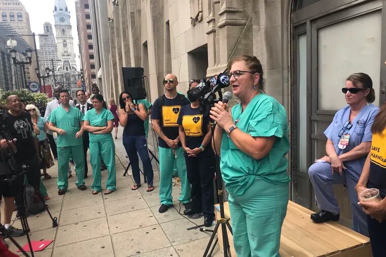 Susan Bowes, registered nurse at Hahnemann University Hospital and president of its union local, addresses a rally aimed at keeping the hospital open, on July 2, 2019.