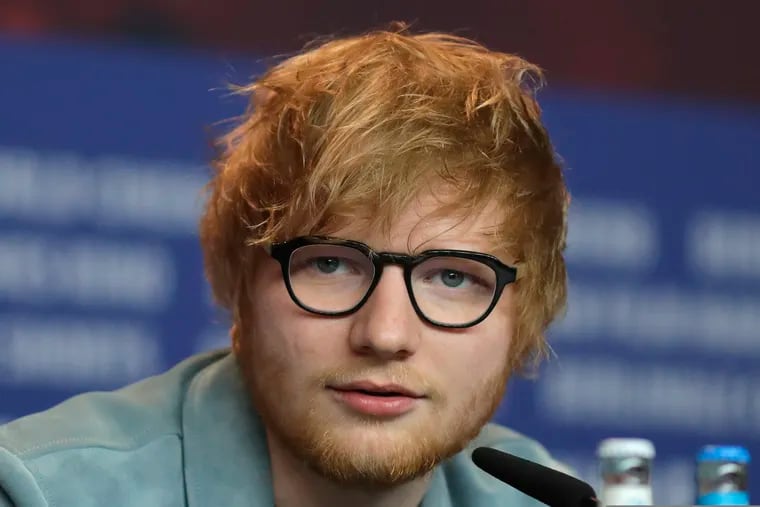 FILE - In this Friday, Feb. 23, 2018 file photo, singer-songwriter Ed Sheeran speaks during a press conference for the film 'Songwriter' during the 68th edition of the International Film Festival Berlin, Berlinale, in Berlin.