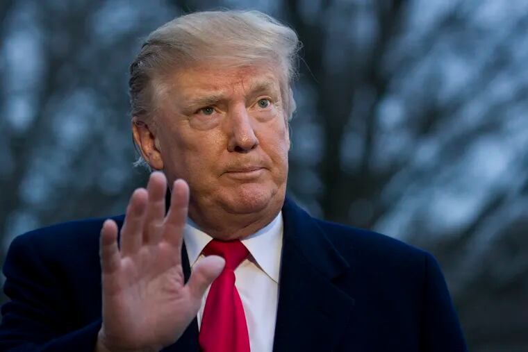 President Donald Trump waves after speaking with the media after stepping off Marine One on the South Lawn of the White House, Sunday, March 24, 2019, in Washington. The Justice Department said Sunday that special counsel Robert Mueller's investigation did not find evidence that President Donald Trump's campaign "conspired or coordinated" with Russia to influence the 2016 presidential election. (AP Photo/Alex Brandon)