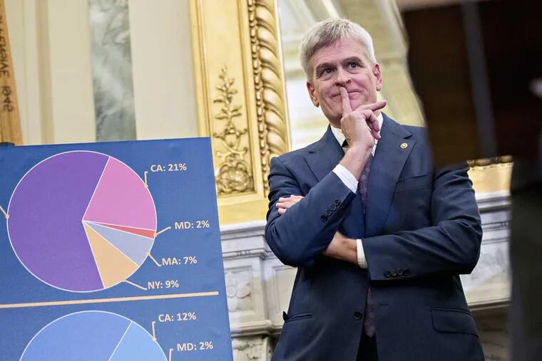 Sen. Bill Cassidy of Louisiana listens a news conference about the health-care plan he and three other Republican senators pushed to upend major elements of the Affordable Care Act.