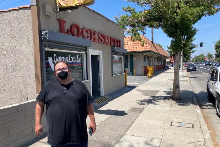 Nick Barragan wears a mask while running errands in Los Angeles on Wednesday.