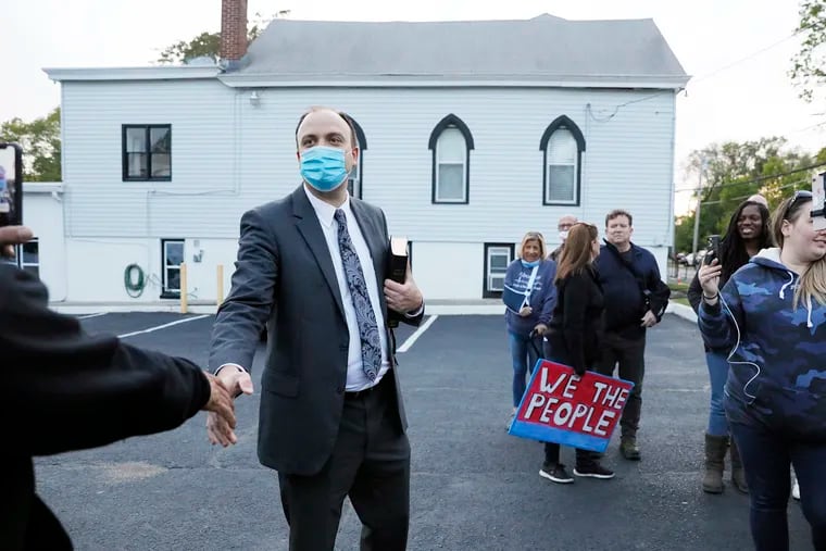 After a church service at Clementon Bible Baptist Church on Wednesday, Pastor Andy Reese thanked supporters for coming out. The church defied Gov. Phil Murphy's shutdown order and held in-person services this past week. Dozens of other pastors in the state have signed onto a letter threatening the governor with a lawsuit.