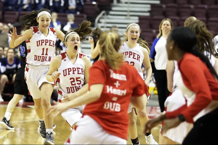 Nicole Kaiser (11), Maggie Weglos (25) and Dayna Balasa (32) celebrate after Upper Dublin’s 41-39 defeat of Central Bucks South in the PIAA Class 6A final.