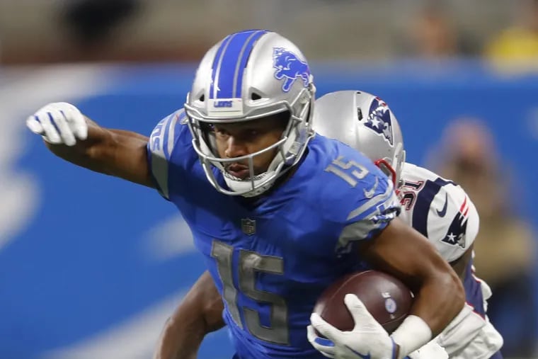 FILE– In this Sept. 23, 2018 file photo, Detroit Lions wide receiver Golden Tate (15) runs the ball after a catch during an NFL football game against the New England Patriots in Detroit. The Philadelphia Eagles acquired Tate from the Detroit Lions in a trade, Tuesday, Oct. 30, 2018, for a third-round draft pick next year. (AP Photo/Paul Sancya)