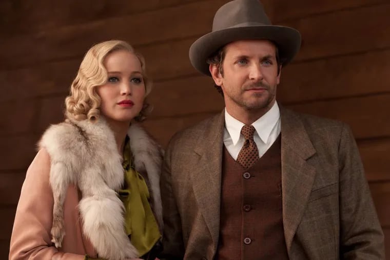 Jennifer Lawrence, left, and Bradley Cooper appear in a scene from "Serena."