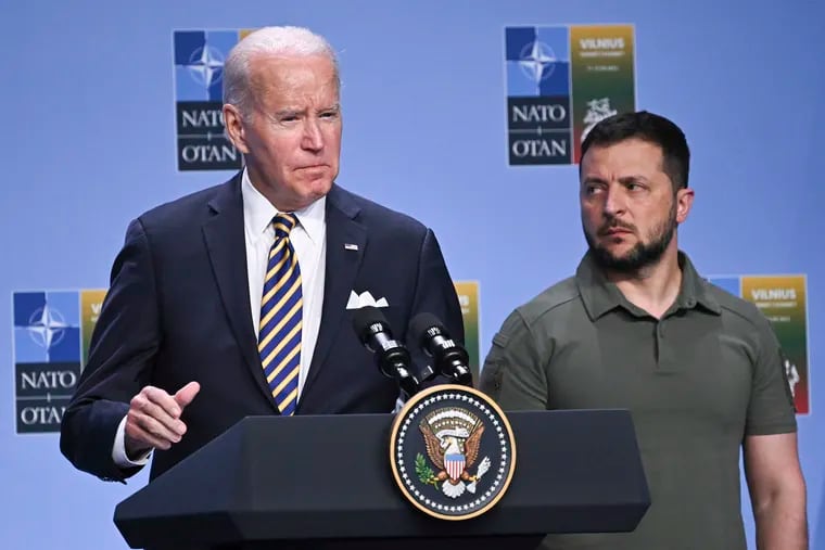 President Joe Biden speaks at an event with G7 leaders and Ukrainian President Volodymyr Zelensky during a 2023 NATO Summit, in Vilnius, Lithuania. Biden must act urgently and use his presidential authority to get aid to Kyiv, writes Trudy Rubin.