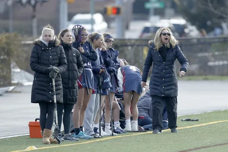 Cardinal OHara coach Jenny Duckenfield (right) is eager to upgrade the girls’ lacrosse team.