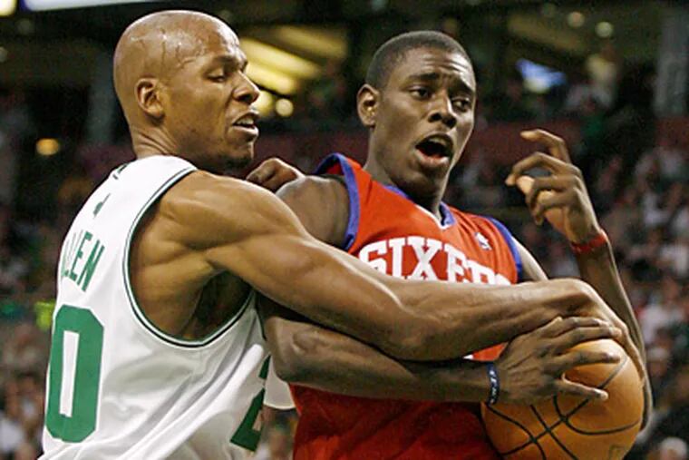 Jrue Holiday, right, battles the Celtics' Ray Allen during a recent game. Holiday has a shoulder injury. (AP Photo/Mary Schwalm)