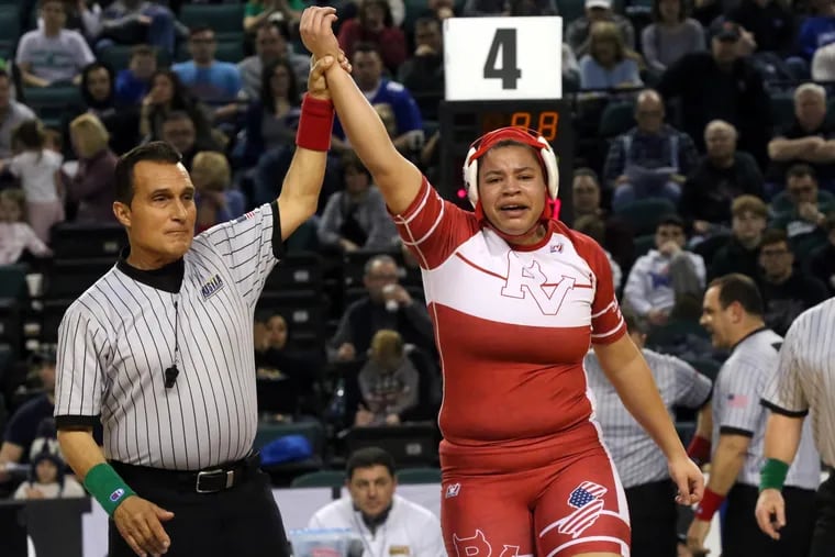 Kaila Mungo, of Rancocas Valley, defeats Kiera Hubmaster, of Kittatinny, in the 235 lb. weight division, during the New Jersey high school wrestling tournament, at Jim Whelan Boardwalk Hall, in Atlantic City,