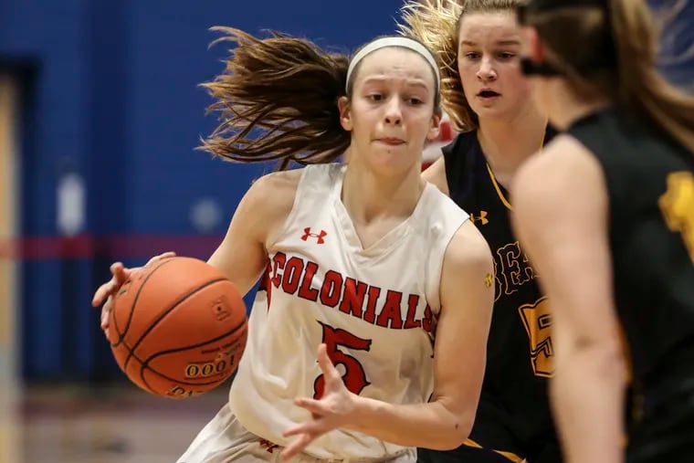 Plymouth-Whitemarsh's Kaitlyn Flanagan drives on Upper Moreland's EmmyFaith Wood during the third quarter in Plymouth Meeting.