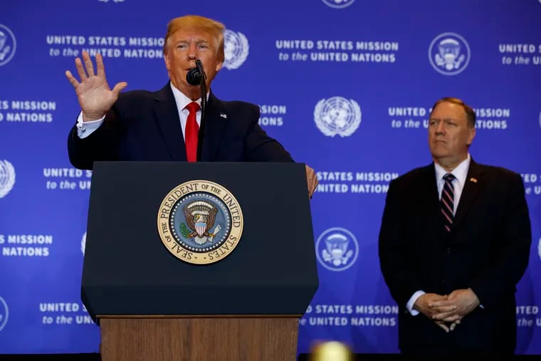 Secretary of State Mike Pompeo listens as President Donald Trump speaks during a news conference at the InterContinental Barclay New York hotel during the United Nations General Assembly, Wednesday, Sept. 25, 2019, in New York.