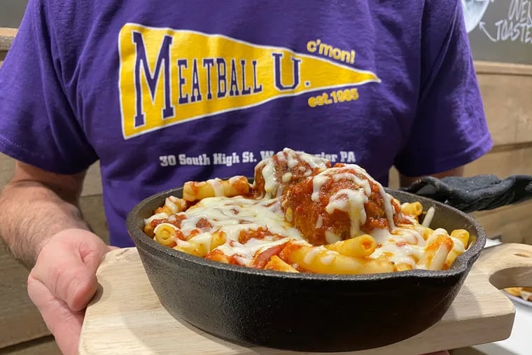 Ziti topped with meatballs, sauce, and mozzarella at Meatball U.