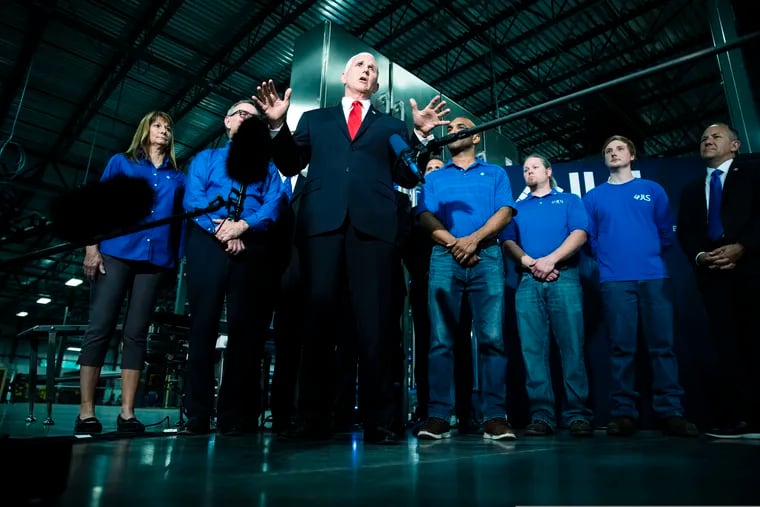 Vice President Mike Pence speaks with members of the media at JLS Automation in York, Pa., Thursday, June 6, 2019. (AP Photo/Matt Rourke)
