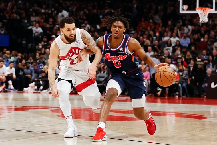 Sixers guard Tyrese Maxey dribbles the basketball against Toronto Raptors guard Fred VanVleet during game three of the first-round Eastern Conference playoffs on Wednesday, April 20, 2022 in Toronto.