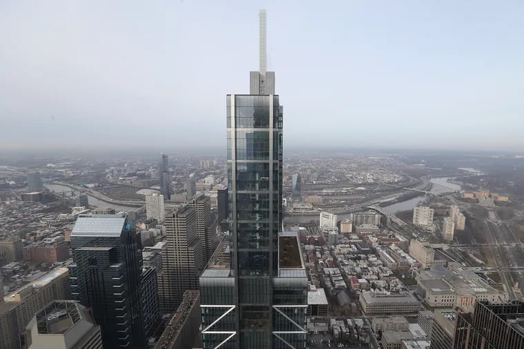 The top of the Comcast Technology Center, as seen from the adjacent Comcast Center.