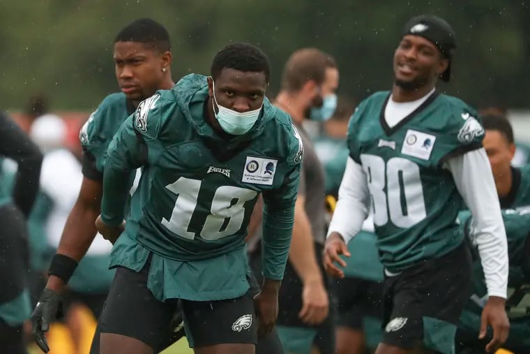 Eagles wide receiver Jalen Reagor (18) warms up before practice at the NovaCare Complex in South Philadelphia on Wednesday, Aug. 19, 2020.