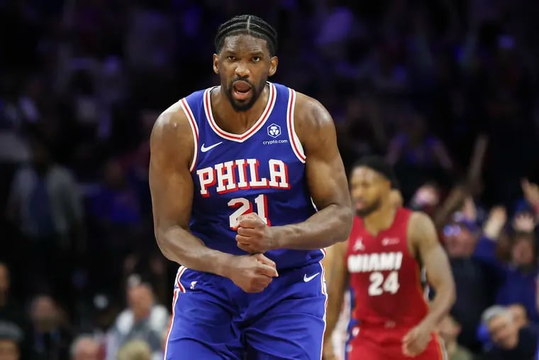 Philadelphia 76ers center Joel Embiid celebrates after his made three-pointer in the fourth quarter of their NBA play-tournament win over the Miami Heat at the Wells Fargo Center in Philadelphia on Wednesday, April 17, 2024.