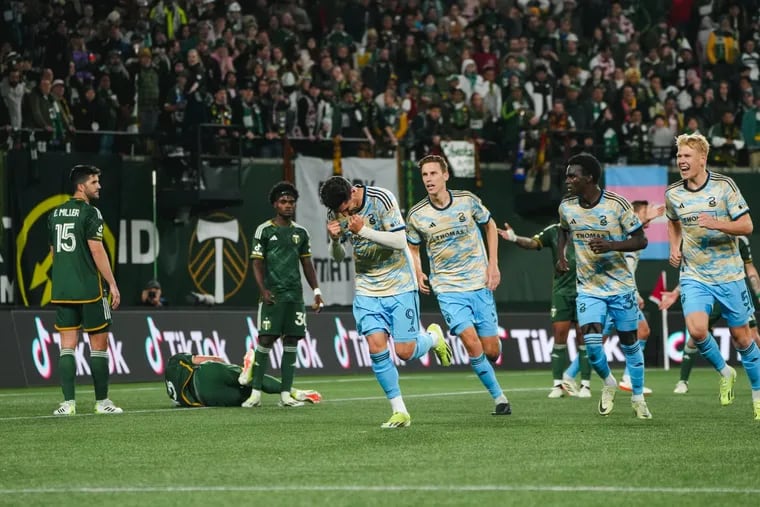 Julián Carranza (center) celebrates scoring a goal in the Union's 3-1 win over the Portland Timbers last weekend.