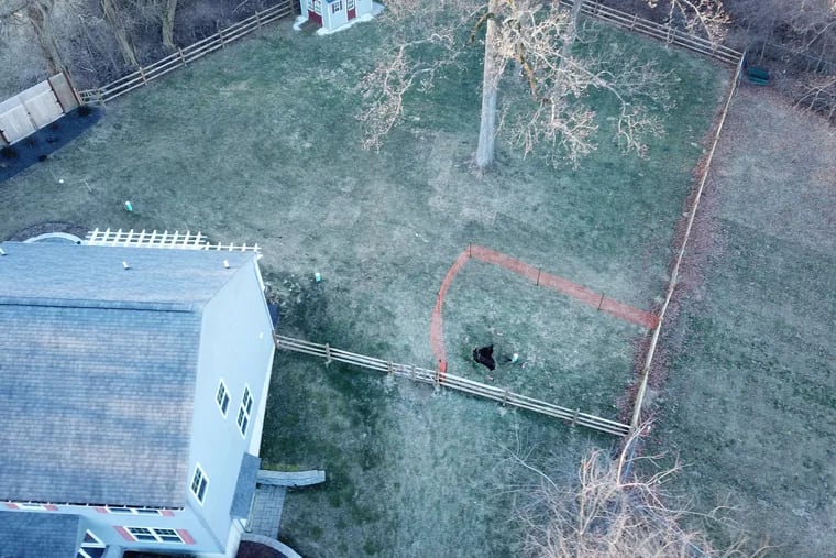 An aerial shot of a 5-foot wide, 10-foot deep sinkhole that emerged outside of a home on Lisa Drive in West Whiteland Township on Sunday, Jan. 20, 2019.