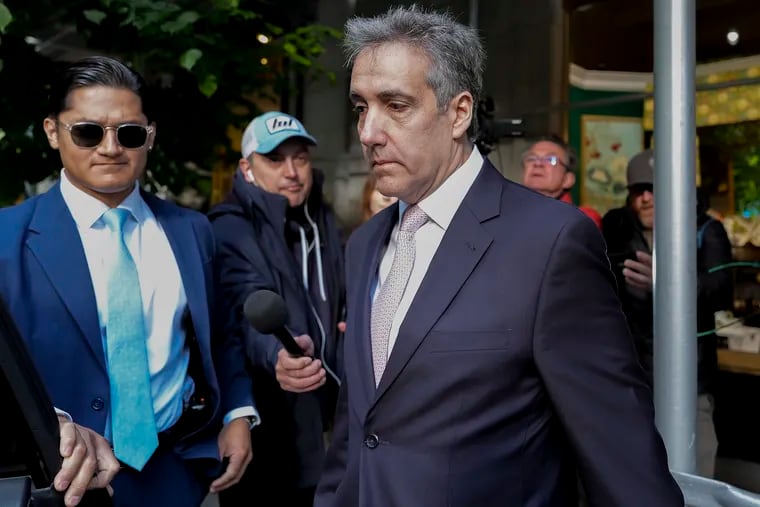 Michael Cohen leaves his apartment building on his way to Manhattan criminal court on Monday, May 13, 2024.