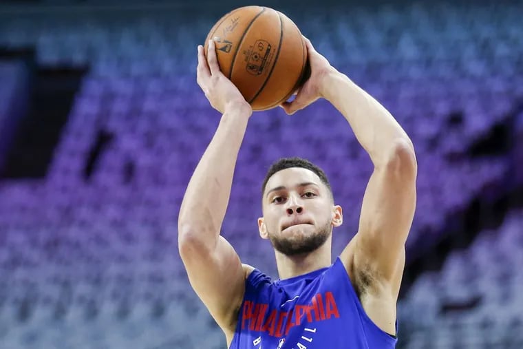 Sixers guard Ben Simmons shoots the basketball during warm-ups before the Sixers play their home opener against the Boston Celtics on Friday.