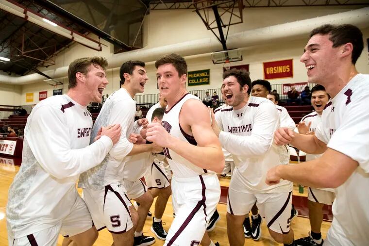 After reaching last season's NCAA Division 3 national championship game, Swarthmore College starts this season ranked No. 1 in the country.  Nate Shafer, center, makes his way through a gauntlet of teammates as he is introduced as part of the starting line-up at their home opener on Nov. 20, 2019.