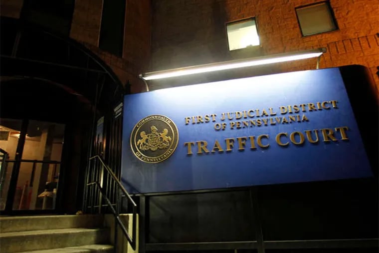 Philadelphia Traffic Court at Eighth and Spring Garden Streets was in session Thursday, but some of the judges hearing cases were from out of town.