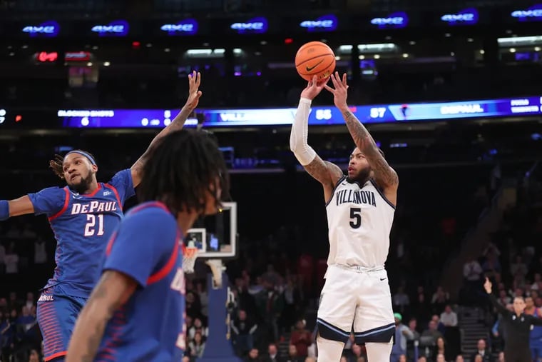 Justin Moore of Villanova shoots the game-winning three-pointer to defeat DePaul, 58-57, in the Big East Tournament on March 13.