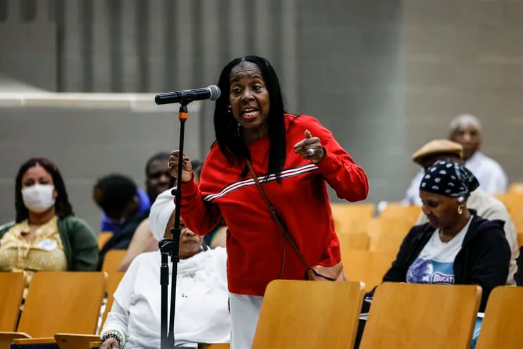 Yvonne Sawyer has questions about triage in residential neighborhoods for the members of Philadelphia City Council during a town hall budget meeting at West Philadelphia High School. Monday, April 29, 2024.