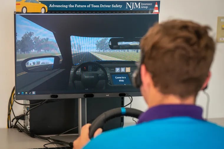 Frank Quinn, 16, takes a driving simulation test at Children's Hospital of Philadelphia's outpatient Karabots Pediatric Care Center. More than 4,000 Philly-area teens have undergone the assessment during primary-care visits.