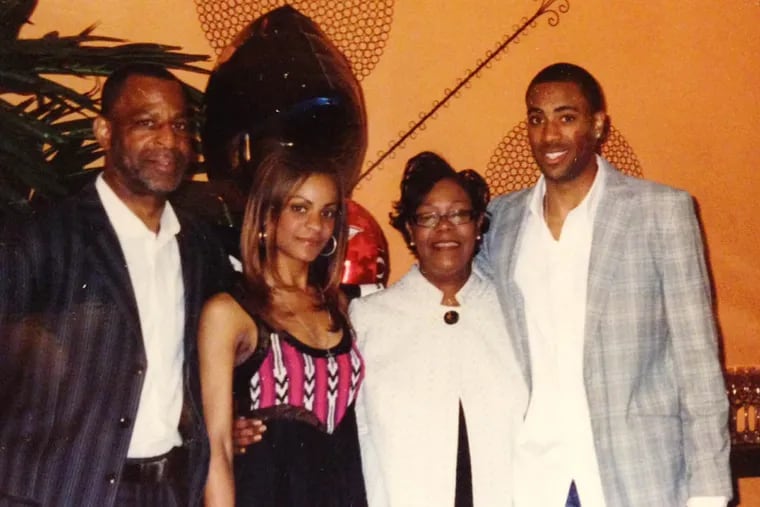 Wayne Ellington Sr. (left), the father of Los Angeles Lakers guard Wayne Ellington Jr. (far right) in a family photo with two of his three children and his wife. The older Ellington was found shot in the head in his car in Germantown. Police have arrested one person.  (family photo)