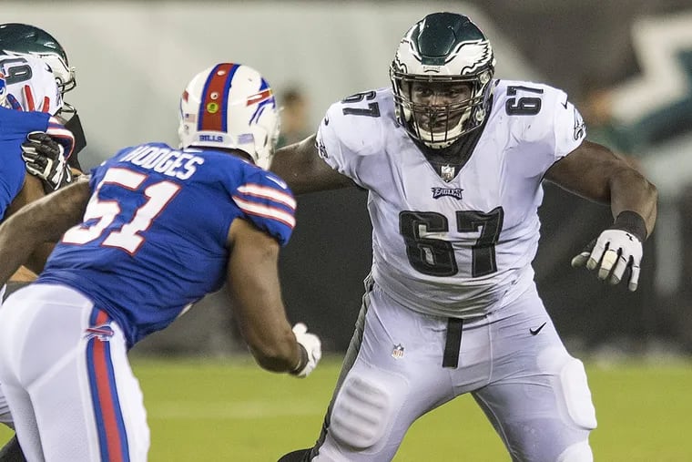 Eagles guard Chance Warmack prepares to make a block in a preseason game against the Bills.