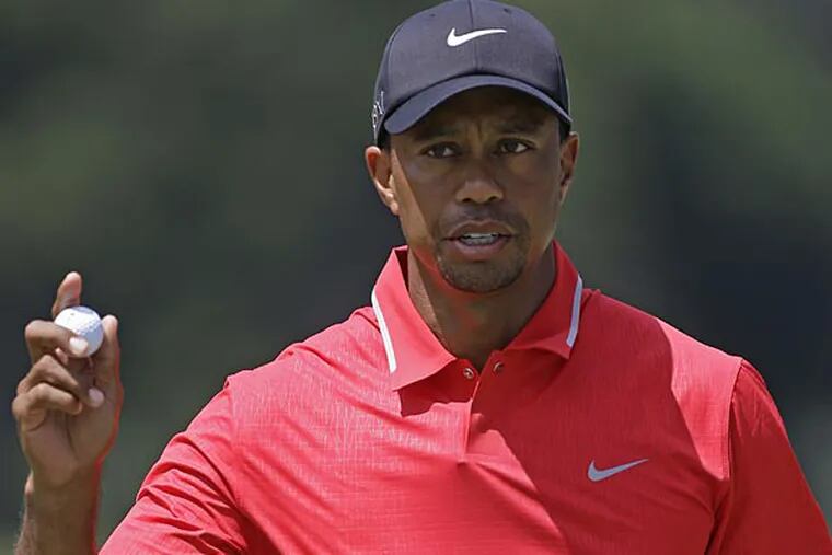 Tiger Woods during the final round of The Players championship golf tournament at TPC Sawgrass, Sunday, May 12, 2013, in Ponte Vedra Beach, Fla. (AP Photo/John Raoux)