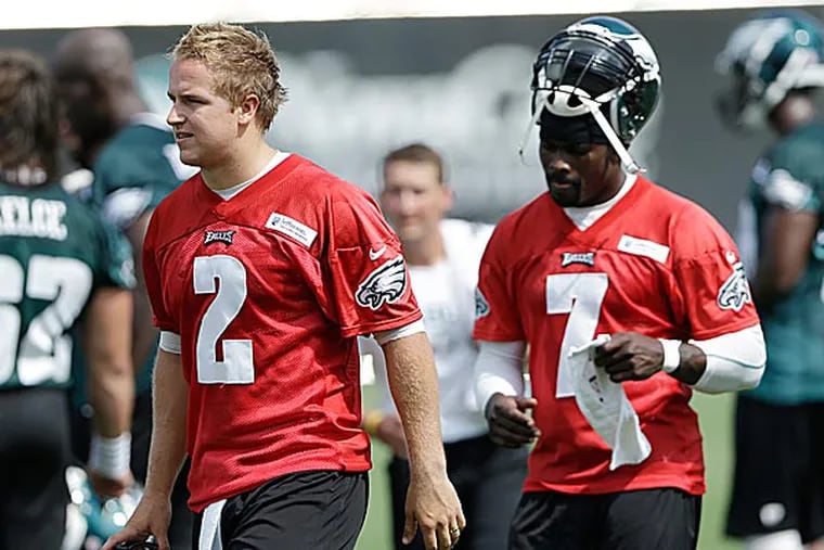 Eagles quarterbacks Matt Barkley and Michael Vick. (Matt Rourke/AP)