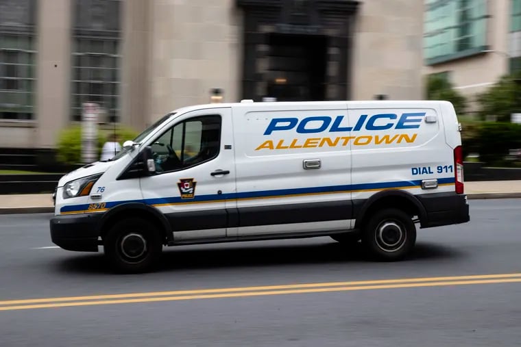 An Allentown, Pa., police van is driven near City Hall on Friday, May 29, 2020.