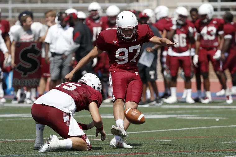 Temple's Aaron Boumerhi kicking a field goal during a scrimmage last year.