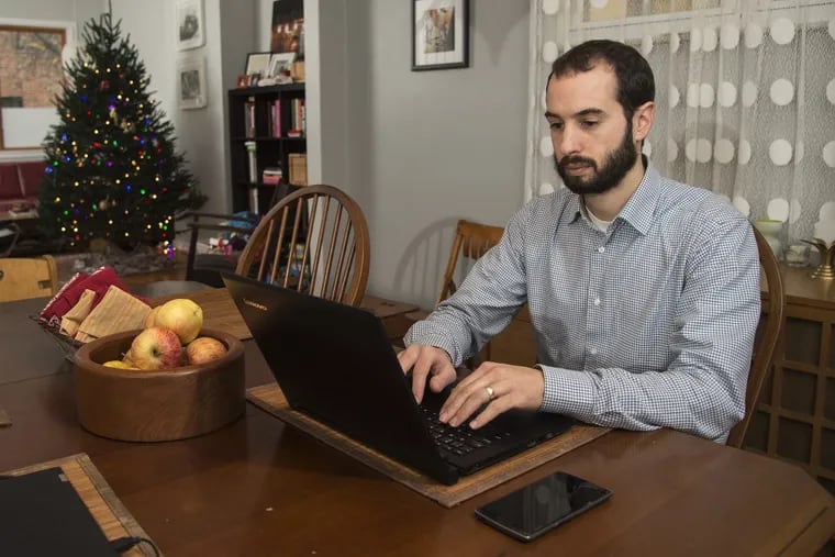 Michael Hollander, a former programmer in Silicon Valley, is now a lawyer for Community Legal Services in Philadelphia, using his software skills to help clients. Often, he works on coding at his home in South Philadelphia.