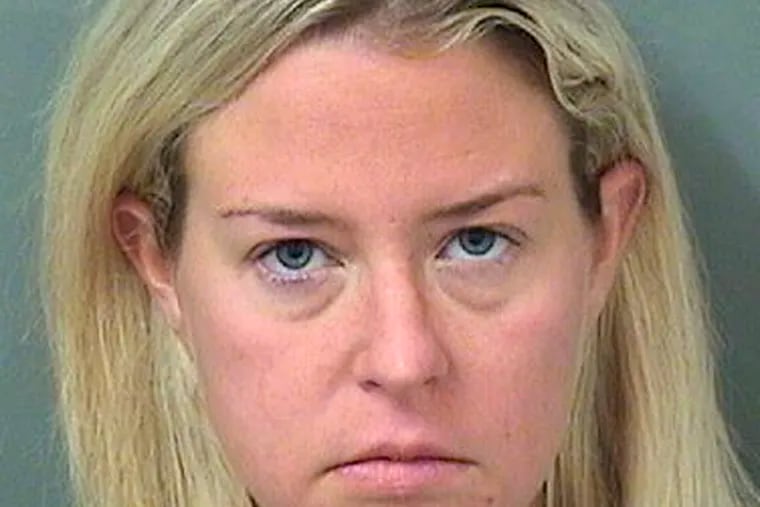 FILE - This file photo provided by the Palm Beach County Sheriff's Office shows Kate Major Lohan shortly after her arrest on a battery charge in Boca Raton, Fla., on July 27, 2018. Lohan has pleaded guilty to disorderly conduct after Pennsylvania state police said she tried to commandeer an occupied bus and attacked its driver last Christmas. Lohan apologized while entering the third-degree misdemeanor plea Wednesday, April 17, 2019. Lehigh County prosecutors withdrew other charges including drunken driving. (Palm Beach County Sheriff's Office via AP)