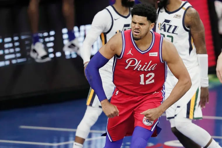 Tobias Harris, striking a strongman pose, has been clutch for the Sixers this season.