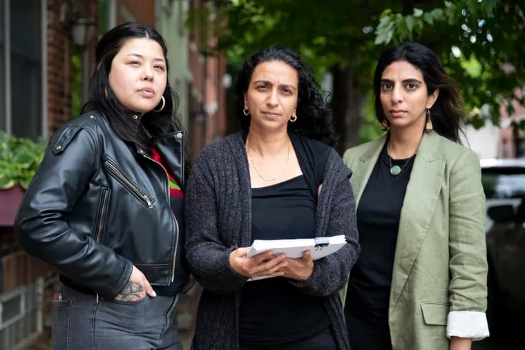 Sarika Kumar M'Bagoyi (center) near her home with Erika Guadalupe Nunez (left), director of Juntos, and Sheila Maddali, director of the National Legal Advocacy Network and a family friend.