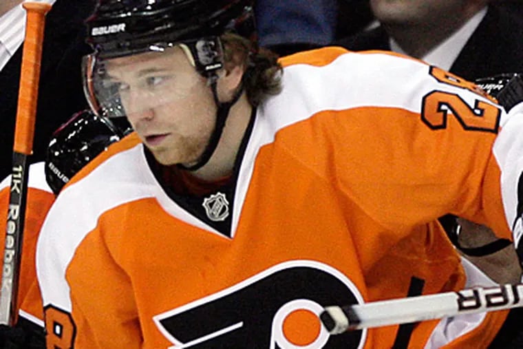 Flyers forward Claude Giroux lives with teammate and fellow all-star Danny Briere. (Yong Kim/Staff file photo)