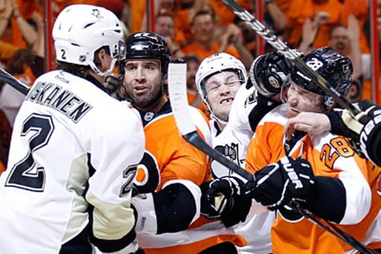 The Flyers and the Penguins amassed 148 penalty minutes in Game 3. (Yong Kim/Staff Photographer)