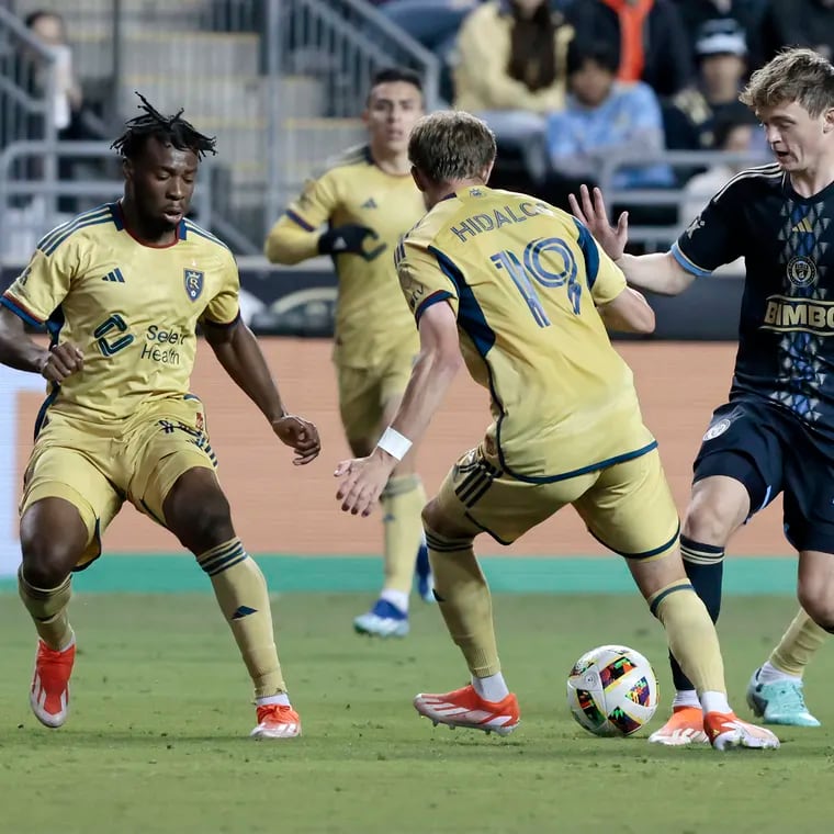 The Union's Jack McGlynn (right) tries to work his way through Real Salt Lake's defense during the first half.
