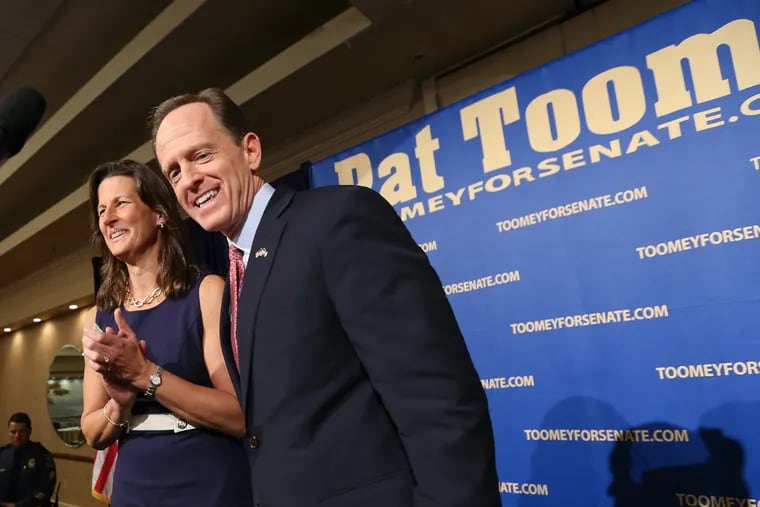 Sen. Pat Toomey with his wife Kris after thanking supporters for helping him get re-elected in Breinigsville Pa., Wednesday, November 9, 2016.